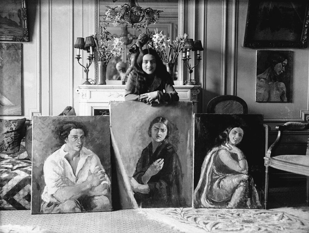 Amrita Sher-gil with her paintings